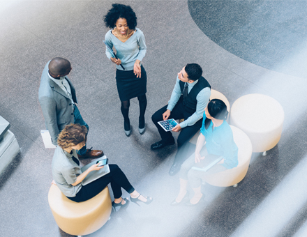 group of people talking on the lobby